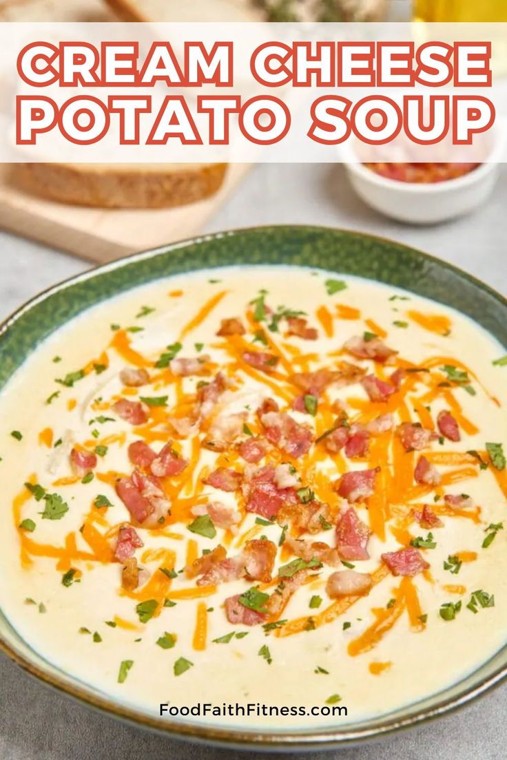 creamy cream cheese potato soup in a green bowl with bacon and cheese on the top