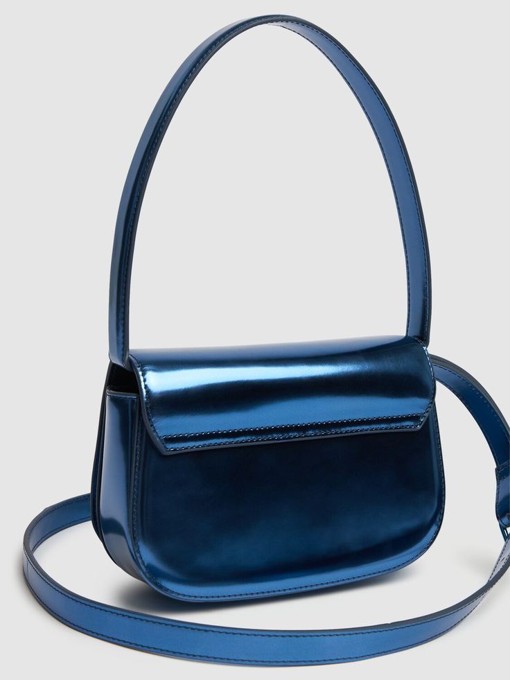 Height: 13.5cm Width: 20.5cm Depth: 6.5cm. Handle drop: 18cm. Strap drop: 42cm. Single top handle. Detachable, adjustable strap. Front flap with magnetic closure. Internal embossed logo detail. Three internal compartments. One internal pocket. Lined Evening Crossbody Baguette Bag With Adjustable Handle, Elegant Blue Baguette Bag With Detachable Strap, Elegant Blue Baguette Bag For Evening, Evening Handheld Baguette Bag With Adjustable Strap, Modern Handheld Baguette Bag For Evening, Formal Handheld Baguette Bag With Adjustable Strap, Evening Blue Flap Bag With Adjustable Strap, Leather Baguette Bag With Detachable Strap For Party, Party Leather Bag With Glossy Finish