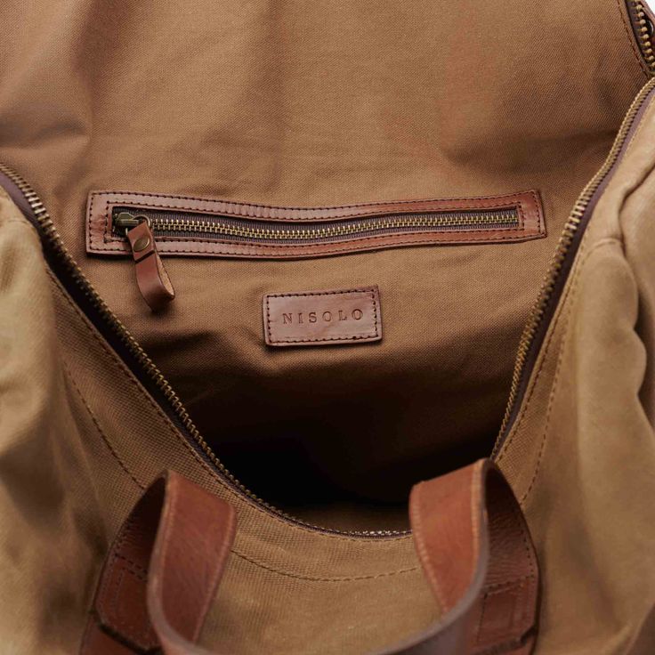 Classically designed with durability and function at its core, meet your new favorite travel bag for that long weekend full of good times. | Men's Luis Weekender Waxed Canvas Filson Bags, Leather Weekender, Ethical Fashion Brands, Cruelty Free Brands, Leg Work, Waxed Canvas, Weekend Getaway, Waxed Cotton, Long Weekend