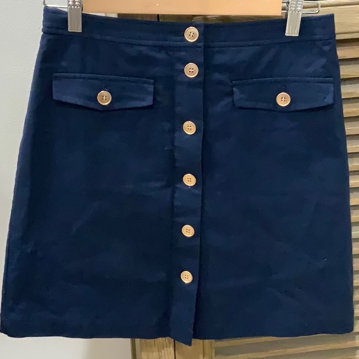 Brand New With Tags Never Worn Classic J.Crew Navy Skirt With Gold Button Details And Pockets. Workwear Mini Skort With Button Closure, Blue Mini Skirt With Button Zip Fly, Cotton Workwear Skirt With Button Zip Fly, Navy Work Skirt With Pockets, Navy Workwear Skirt With Pockets, High Waist Button Closure Skort For Work, High Waist Skort With Button Closure For Work, Button-up Mini Skirt With Pockets For Work, Preppy Cotton Skirt For Workwear