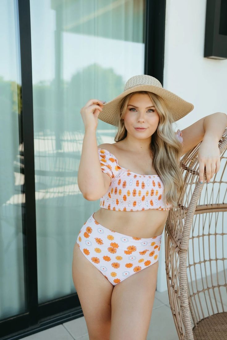 Make a splash with our Orange floral print smocked bikini. This 2pc swimsuit for women features a playful floral print and smocked detailing for a flattering fit. Perfect for lounging by the pool or catching some waves. Get ready to turn heads in this quirky and fun swimsuit! soft & stretchy，UPF 50+ 87% nylon 13% spandex Summer Swimwear With Smocked Bodice For Vacation, Casual Vacation Swimwear With Smocked Bodice, Spring Beach Party Swimwear With Smocked Bodice, Casual Swimwear With Smocked Bodice For Vacation, Casual Smocked Bodice Swimwear For Vacation, Summer Beach Swimwear With Smocked Bodice, Beachy Summer Swimwear With Smocked Bodice, Beachy Swimwear With Smocked Bodice For Summer, Beachy Fitted Swimwear With Smocked Bodice