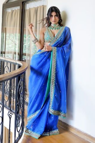 Blue pre-draped saree with an attached cancan and mirror, cutdana and floral hand embroidery. Comes with a padded blouse. - Aza Fashions Blue Draped Saree With Cutdana, Blue Pre-draped Saree With Mirror Work, Blue Draped Lehenga With Dupatta, Blue Bollywood Draped Blouse Piece, Blue Draped Bollywood Blouse Piece, Bollywood Style Draped Blue Blouse Piece, Blue Draped Saree With Dupatta, Floral Hand Embroidery, Draped Saree