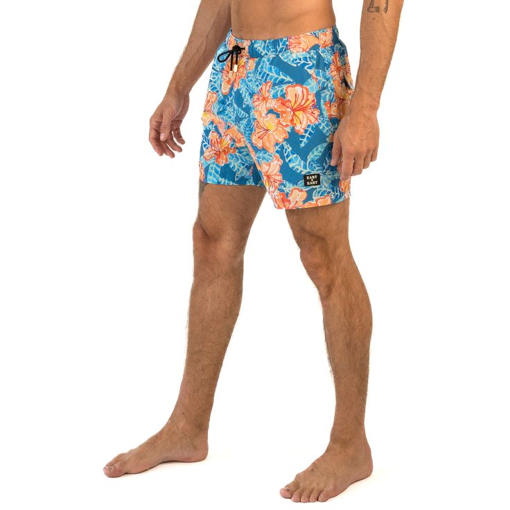 Dive into summer with our Rio-inspired men's swim shorts. Embrace the tropical Brazilian style and enjoy the beach in comfort and style. Our shorts are designed for the modern man who wants to make a statement while enjoying the sun, sand, and sea. Shop now and upgrade your swimwear collection with our vibrant and trendy Rio-inspired swim shorts. Sand And Sea, Brazilian Style, Mens Swim Shorts, Enjoying The Sun, Man Swimming, Swimwear Collection, Mens Swimwear, Modern Man, Swim Shorts