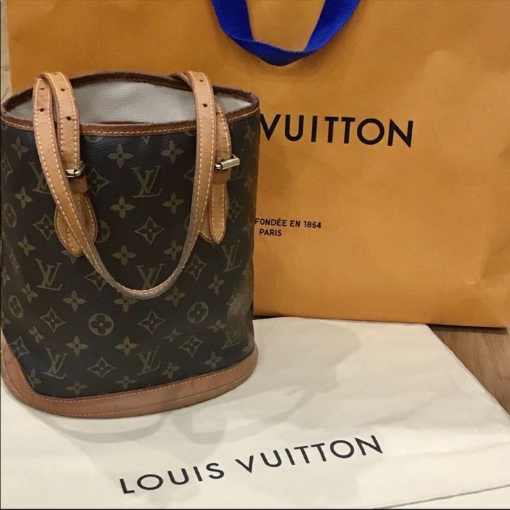 Description In Last Photo Authenticated By Real Authentication See Confirmed Authentic In Second Photo There Is Another Listing For This Same Bag To Show Additional Pictures Louis Vuitton Brown, Louis Vuitton Bags, Authentic Louis Vuitton, Womens Tote Bags, Louis Vuitton Bag, Louis Vuitton Monogram, Bucket Bag, Bag Lady, Louis Vuitton