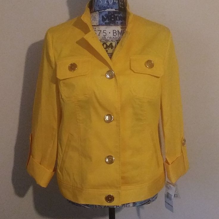 Fun For Spring/Summer Yellow With Gold Button Accents Jones New York Jacket. Ribbed. Collared. Stretch. Cuffed Sleeves With Buttons. Fake Hand Pockets But Has Breast Pockets. Extra Button Attached. Cute Jacket. Approx. 23in Shoulder To Hem And 18in Pit To Pit Casual Summer Blazer With Button Cuffs, Trendy Yellow Spring Blazer, Spring Day-out Blazer With Buttons, Summer Button-up Outerwear With Button Cuffs, Casual Yellow Single Breasted Outerwear, Casual Yellow Single-breasted Outerwear, Spring Yellow Blazer, Yellow Summer Outerwear For Day Out, Spring Outerwear With Gold Buttons And Long Sleeves