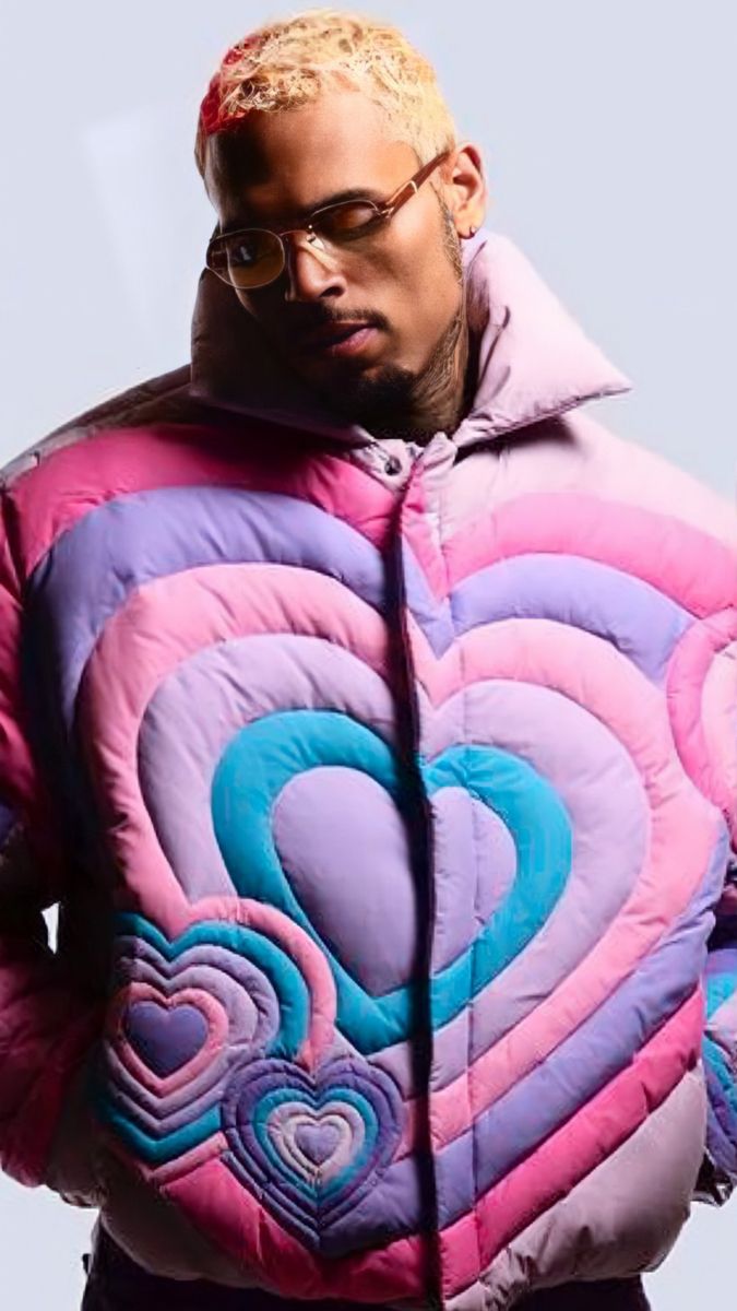 a man in a puffy jacket with heart shapes on it