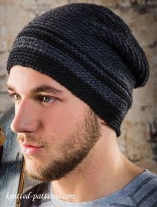 a man with a beard wearing a knitted hat