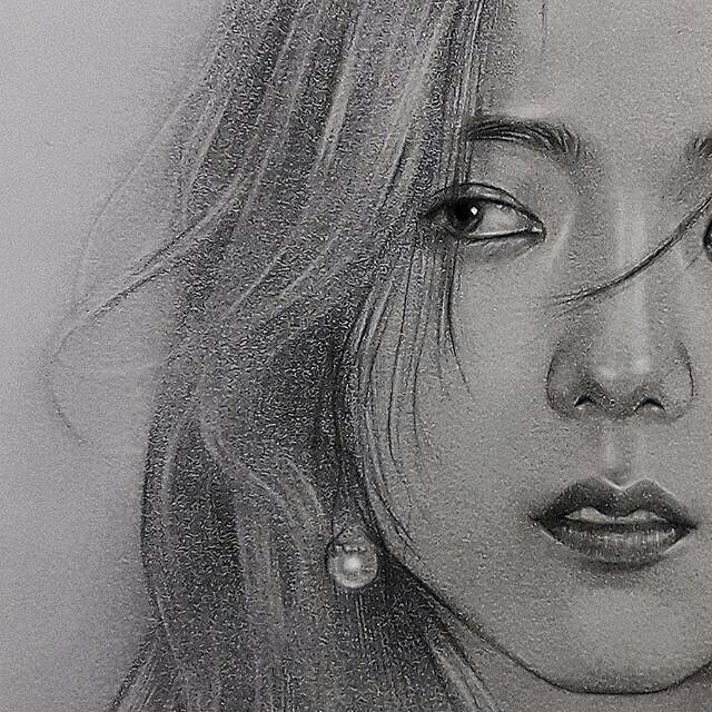 a pencil drawing of a woman's face