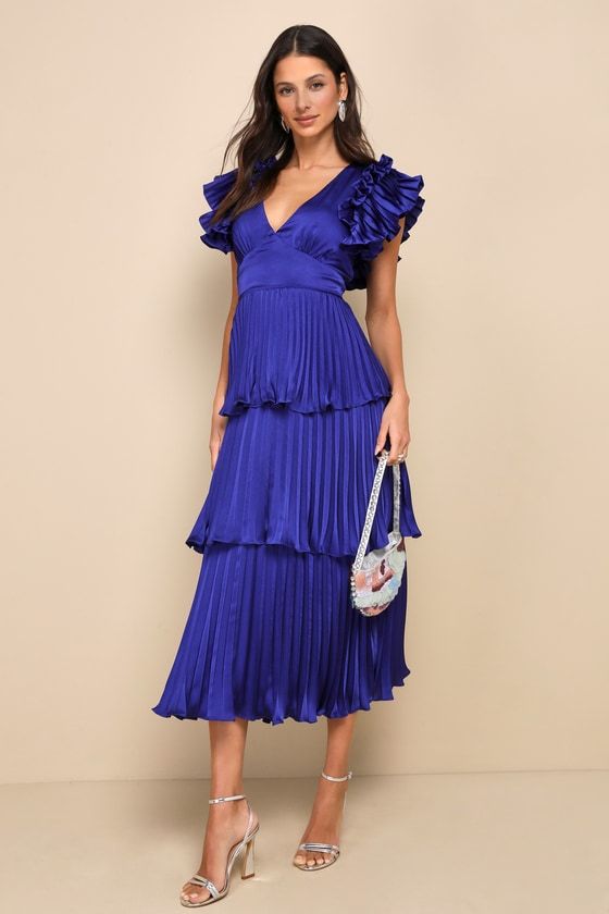 You'll radiate with effortless lavishness all day long with a look like the Lulus Stunning Desire Cobalt Blue Satin Pleated Tiered Midi Dress! Sleek pleated woven satin lends luxe dimension to this fabulous dress that features flouncy, ruffled short sleeves, that frame a lightly gathered bodice and an alluring V-neckline. A flattering set-in waist tops a figure-skimming, A-line skirt that boasts tiered layers as it cascades down to an elegant midi hem. Hidden back zipper/clasp. Fit: This garment fits true to size. Length: Ankle length. Size medium measures 51" from shoulder to hem. Bust: Great for any cup size. Waist: Fitted - very fitted at natural waist. Hip: Not Fitted - fuller skirt allows room for hips. Undergarments: May be worn with any standard bra. Fabric: Fabric has no stretch. L Cute Blue Dresses, Fabulous Dress, Lulu Fashion, Aesthetic Outfit Ideas, Tiered Midi Dress, Summer Dress Outfits, Fabulous Dresses, Pleated Midi Dress, Lulu Dresses