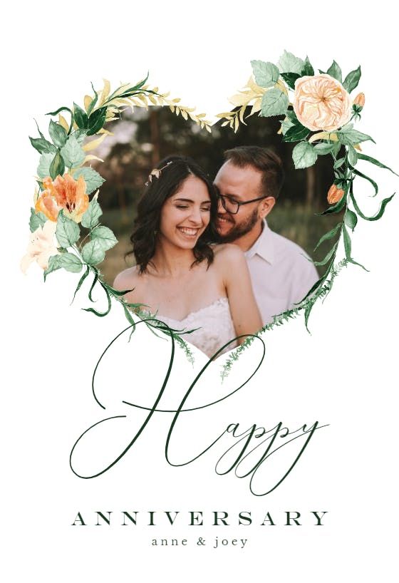 an anniversary card with the words happy on it and flowers in the middle, surrounded by leaves