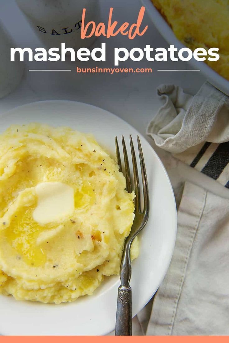 mashed potatoes on a white plate with a fork next to it and the words baked mashed potatoes