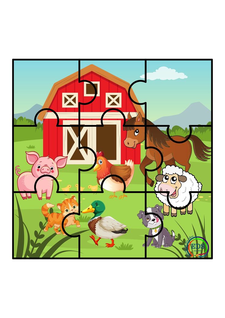 a puzzle with farm animals on it and a barn in the backgroung