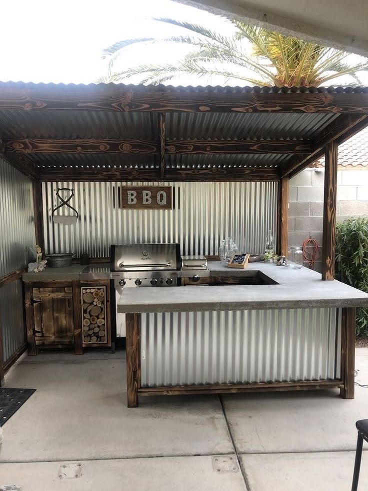 an outdoor kitchen made out of shipping containers