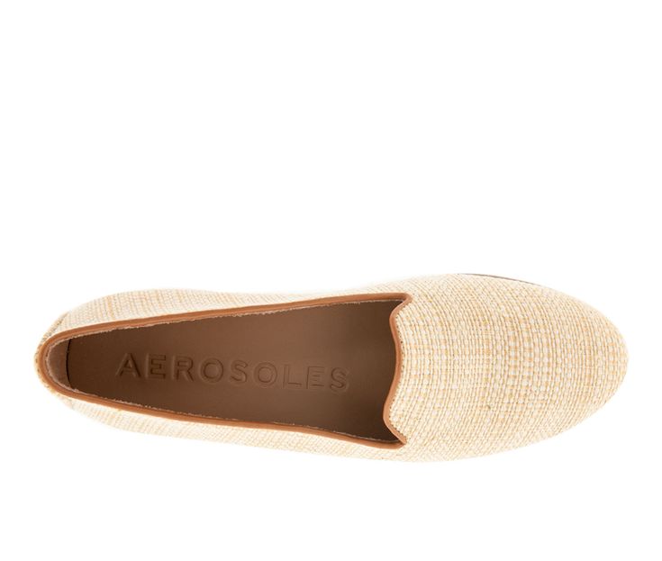 Aerosole's Betunia is an updated version of a classic slip-on loafer that you totally need in your closet. The flattering almond toe creates a smart silhouette, while the soft memory foam insole provides ultimate comfort with every step. Pair the Betunia with anything from your favorite pair of jeans or your favorite work outfit for a classic and stylish look! Faux Leather, Leather Denim, or Raffia Fabric upper, Easy slip-on entry, Approx. 3/4 inch heel, Foot flattering almond toe, Soft memory f Classic Beige Slip-ons For Fall, Slip-on Loafers With Woven Sole And Flat Heel, Beige Flat Loafers, Classic Round Toe Slip-ons For Spring, Beige Cushioned Slip-ons For Work, Comfortable Slip-on Loafers With Pointed Toe, Summer Slip-on Loafers, Comfortable Slip-on Loafers For Summer, Spring Beige Slip-on Loafers