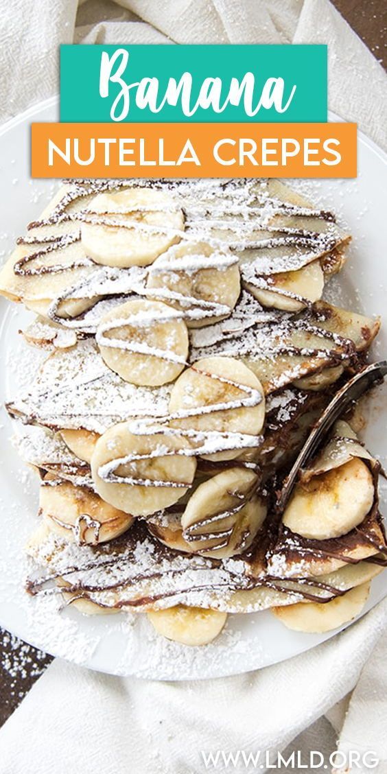 banana nutella crepes on a white plate with powdered sugar and chocolate