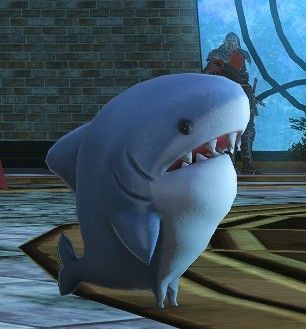 an animated shark with its mouth wide open