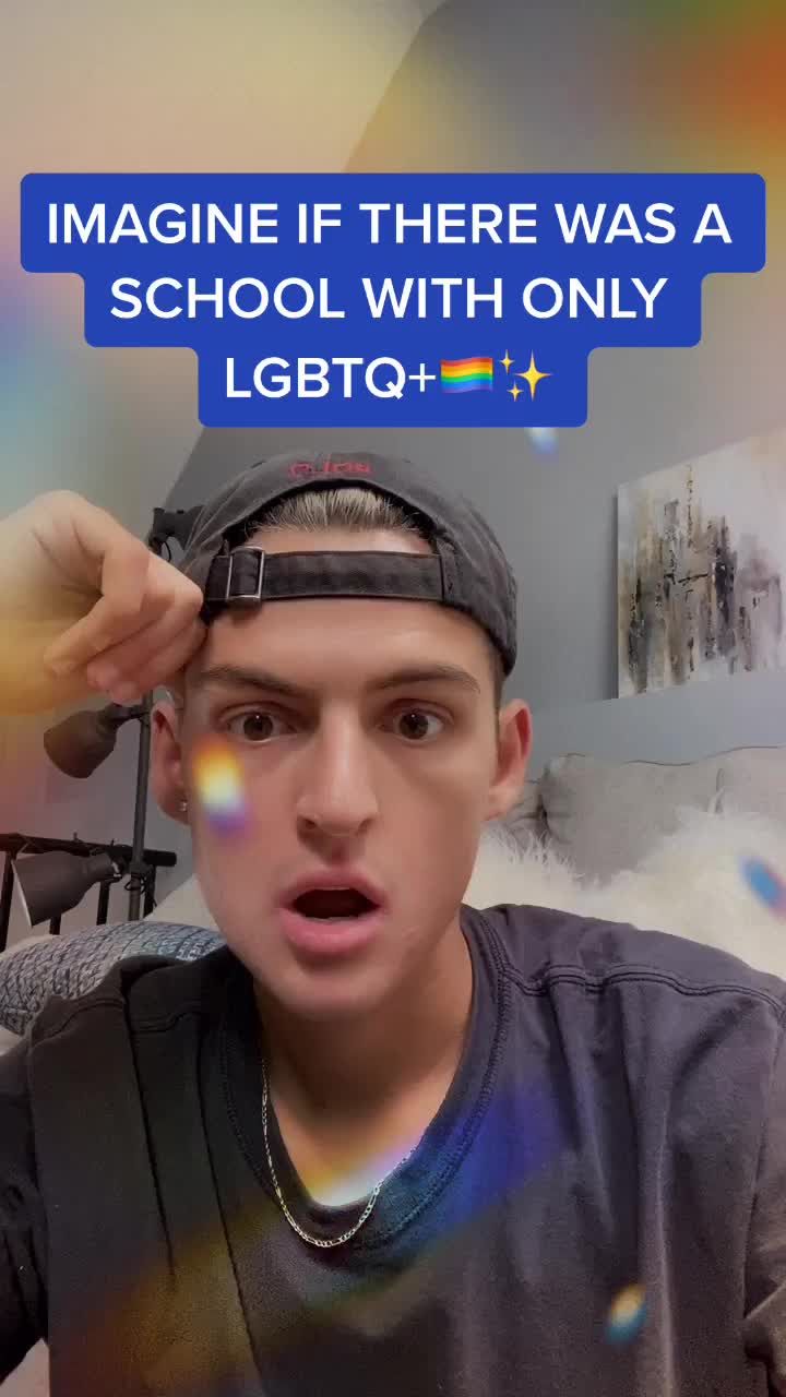 a man holding his hat over his head with the caption imagine if there was a school with only lgbt