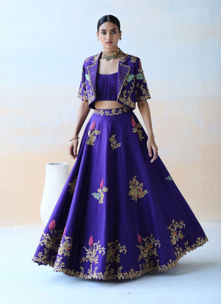 Editor's Note A Purple Lehenga Set In Dupion Silk Base Featuring Multicolor Floral Thread Embroidery Highlighted With Sequins, Cut Dana And Various Other Embellishments. It Is Paired Up With An... Lehenga For Petite Women, Purple Ghagra, Lehenga Embroidery Design, Lehenga Inspiration, Orang India, Jacket Lehenga, Purple Lehenga, Indian Outfits Lehenga, Luxury Pret