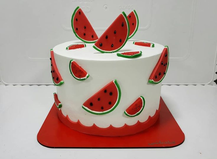 a cake with watermelon slices on it