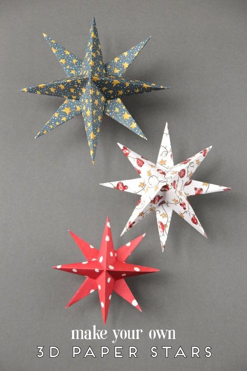 three origami stars on a gray background with the title diy 3d paper stars