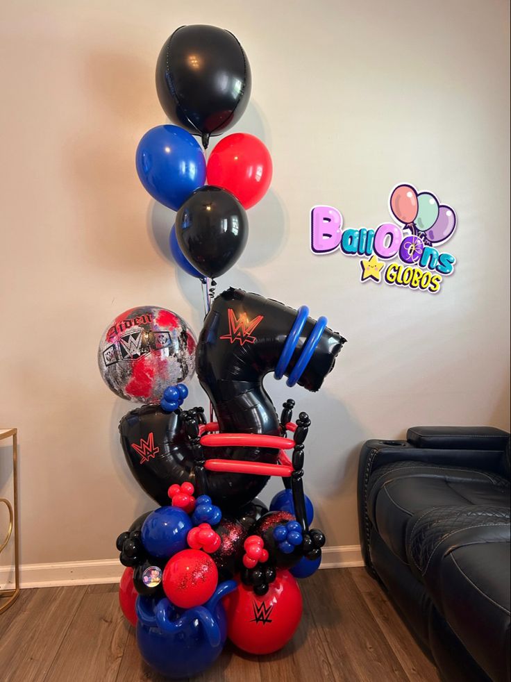 balloons are arranged in the shape of boxing gloves