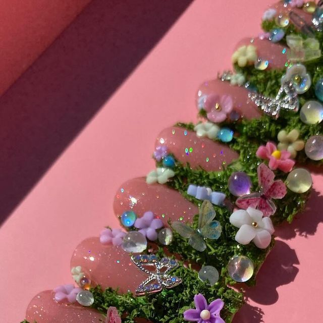 Hi Im Chyna, Luxury press on Artist 💗 on Instagram: "Shes such a beauty  Will forever be one of my Favorite sets to make 😍 ✨Eves Garden ✨ SWIPE TO SEE DETAILS  • • Link in bio🛍️ • • • #gardennails #gardennail #flowernail #flowernails🌺 #fairynails #fairynail #fairynailart #fairycorenails #fairycoreaesthetic #fantasynails #fantasynailart #butterflynails🦋 #butterflynailart #mossnails #presson #pressonnailset #luxurypressons #acrylicpressons" Moss Garden Nails, Flower Garden Nails, Garden Themed Nails, Enchanted Forest Nail Designs, Enchanted Garden Nails, Garden Nails Design, Melanie Nails, Fairy Garden Nails, Fairy Nails Designs