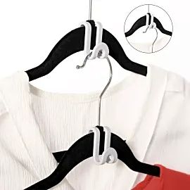 two clothes hangers attached to the back of a white t - shirt with black and red details