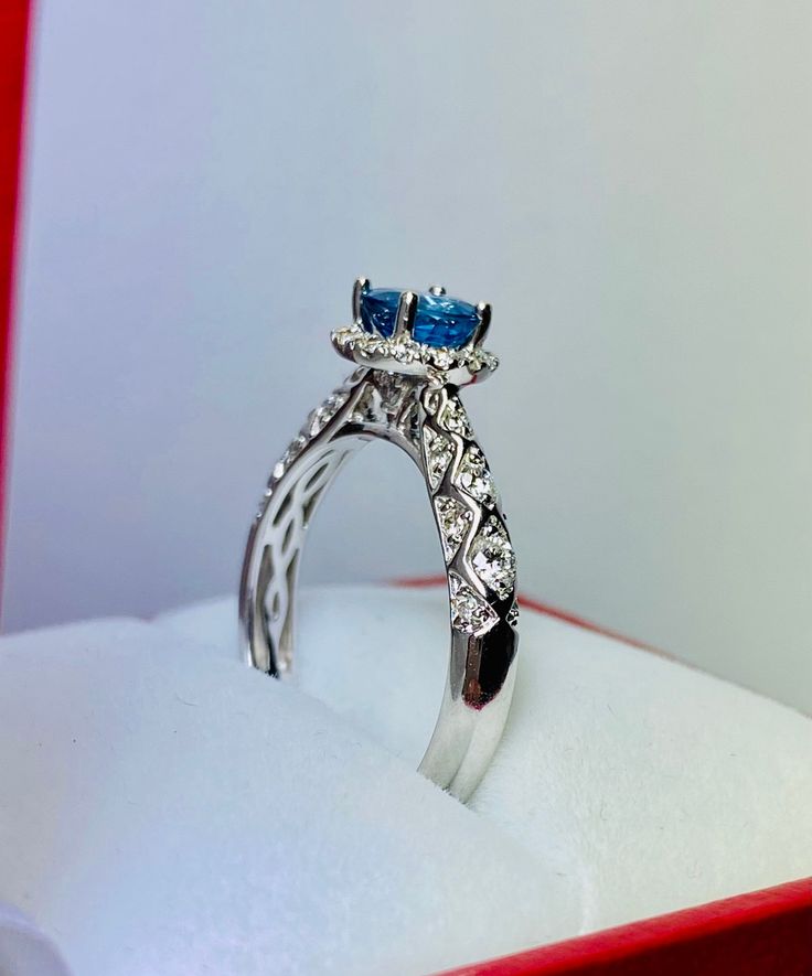 Gorgeous 14k White Gold Sapphire and halo Diamond Ring: Sapphire: 0.74CT Side Diamonds: 0.40CT Color: E Clarity: VS2 Total ring weight: 3.5GR 14K White Gold Ring sizing available free of charge For more information regarding this item feel free to reach me so I can accommodate your needs. Thank you Luxury Cluster Halo Ring, Gia Certified Diamond Cluster Halo Ring, 14k White Gold Cluster Ring With Halo Design, Gia Certified Round Cut Halo Ring For Promise, Platinum Diamond Ring With Halo Design And Cluster Shape, Silver 14k White Gold Halo Wedding Ring, Promise Ring With Halo Princess Cut Diamond, Dazzling 14k White Gold Halo Promise Ring, Gia Certified Silver 14k White Gold Cluster Ring