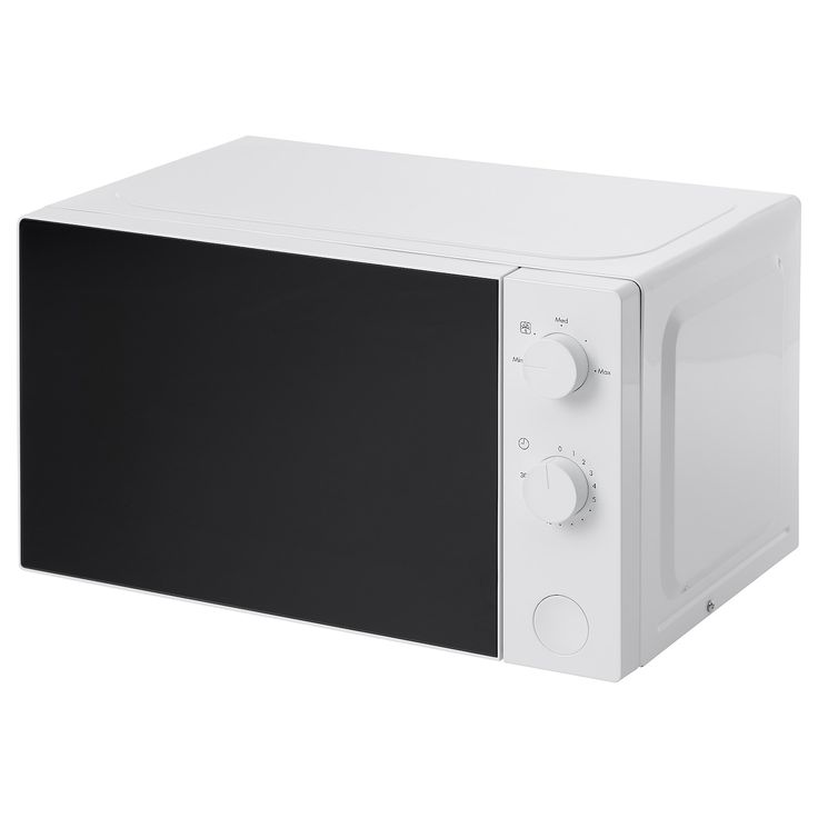 a white microwave oven sitting on top of a counter next to a black and white wall