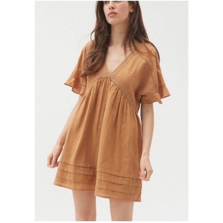 Urban Outfitters Venus Mini Frock Dress In Brown/Gold Size Xs (Can Fit A Size Small As Well) Brand New With Tag Solid Cotton V-neck Mini Dress, Casual Mini Hem Lined Dress, Brown V-neck Dress With Ruffle Hem, Summer V-neck Mini Dress With Relaxed Fit, Chic Mini Dress With Relaxed Fit, Relaxed Fit V-neck Mini Dress For Summer, Chic Relaxed Fit Mini Dress, Chic Relaxed-fit Mini Dress, Relaxed Fit V-neck Dress With Ruffles