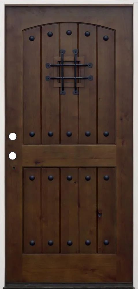 a wooden door with metal handles and knobs on the front doors, which are made out of wood