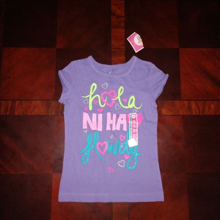 Brand New Never Worn Girl's T-Shirt. Says Hello In Three Different Languages. Really Cute Shirt Playful Purple Cotton T-shirt, Cute Purple Top With Letter Print, Playful Purple Cotton Tops, Cute Purple Top With Graphic Print, Fun Purple Short Sleeve Tops, Fun Short Sleeve Purple Tops, Cute Purple Shirt With Graphic Print, Cute Purple Short Sleeve Shirt, Fun Purple Cotton Tops