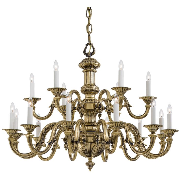 an antique chandelier with white candles