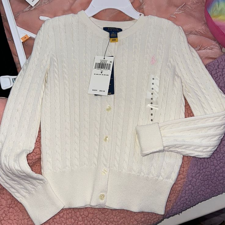 Polo Ralph Lauren - Toddler Cardigan - Cream Color - Size: 6 -7 - Excellent Condition White Winter Sweater For School, White Long Sleeve Sweater For School, Cute White Crew Neck Cardigan, Preppy White Cardigan For Fall, White Preppy Cardigan For Fall, Winter School Fitted Sweater, Preppy Long Sleeve Cotton Cardigan, Fitted Winter Sweater For School, Preppy Cotton Cardigan With Long Sleeves