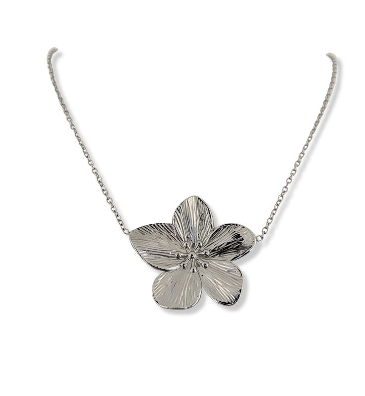 Cherry blossom flowers carry deep and meaningful symbolism for many people. Now you can elevate your look with this stunning necklace adorned with a large, intricately detailed blossom. It's the ideal accessory for any occasion and will be sure to make a statement. Gold PVD 18k or Platinum Chain Length: 16" + 2" extender Flower Size: 32mm x 34mm Every piece of jewelry you order is delivered in an elegant organza bag. For that extra special touch, consider our upgraded Gift Package Option during Luxury Flower Pendant Necklace With Flower Charm, Elegant Flower Shaped Large Pendant Jewelry, Elegant Flower-shaped Large Pendant Jewelry, Elegant Floral Large Pendant Jewelry, Elegant Flower Pendant Jewelry, White Gold Flower Charm Necklace, Luxury Necklace With Flower Charm And Pendant, White Gold Flower Shaped Necklace, White Gold Necklace With Large Flower Pendant