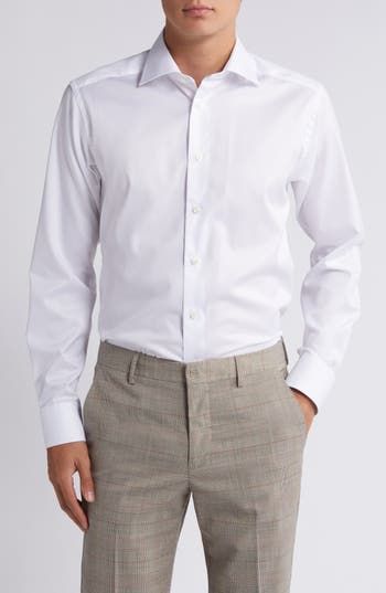 Cut in a slim fit, this sharp dress shirt is constructed from high-performance, crease-resistant cotton and fitted with a classic spread collar. 32" length; 45" chest (size 16.5) French placket Spread collar Mitered, adjustable button cuffs Darts at the back to adjust the width Curved hem 100% cotton Dry clean or machine wash, line dry Imported Elegant Wrinkle-resistant Button-up Shirt, Semi-formal Slim Fit Collared Shirt, Tailored Cotton Dress Shirt For Office, Elegant Long Sleeve Shirt With Welt Pockets, Formal Long Sleeve Shirt With Welt Pockets, Semi-formal Dress Shirt With Welt Pockets, Custom Fit Long Sleeve Shirt For Workwear, Elegant Shirt With Welt Pockets For Office, Fitted Smart Cotton Shirt