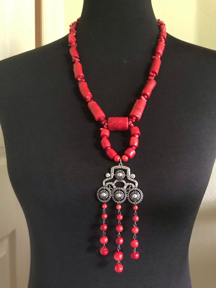 "Red Bamboo natural stone goes beautiful with a silver metal decorative element and dangling small round coral beads. Necklace is app.24\" long around and has app.6\" long piece in the center. Handmade item. Closes with a silver toggle clasp. Comes in a gift box with a matching earings as a bonus. Ships from Palm Coast Fl" Red Bamboo, Coral Beads Necklace, Bamboo Coral, Palm Coast, Coral Necklace, Coral Beads, Beads Necklace, Toggle Clasp, Pendant Necklaces