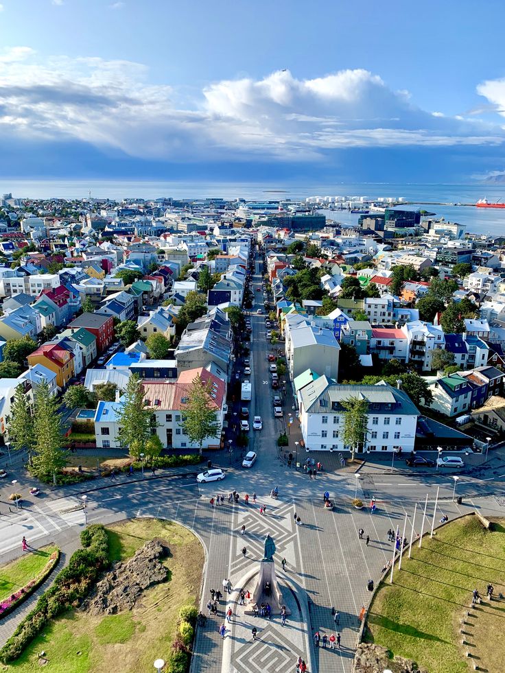 an aerial view of a city with lots of buildings