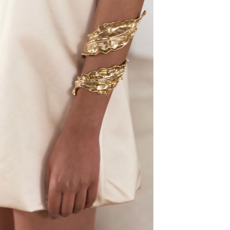 Metal Textured Leaf Shaped Cuff Bracelet. Brand Zara Color Golden | 1856/073 Composition Outer Shell 99% Zinc 1% Steel Condition New In The Brand’s Original Manufacturer’s Package New In 2024 Gold Leaf Arm Cuff, Wrap Around Bracelets, Gold Bracelet For Formal Occasions In Spring, Formal Gold Bracelet For Spring, Zara Gold Jewelry For Summer, Chic Bracelets For Spring Parties, Gold Cuff Bracelets For Spring, Elegant Summer Wedding Bracelets, Chic Evening Jewelry From Zara