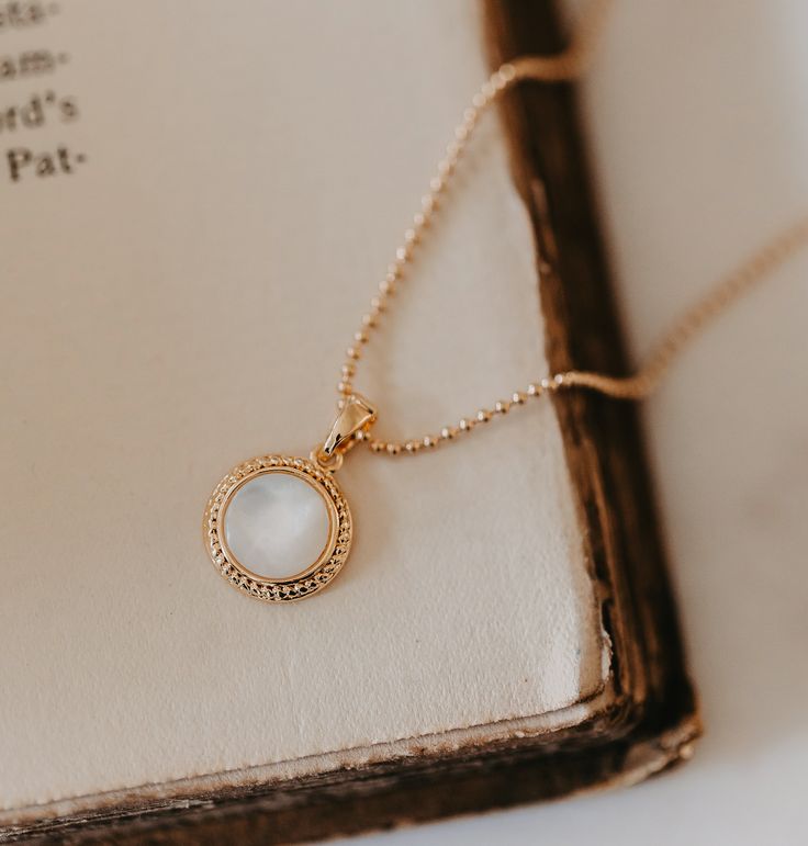 Details: -18'' gold-filled ball chain -Mother of pearl pendant Adornment Jewelry, Outdoor Textiles, Ball Chain, Pearl Pendant, Paper Goods, Mother Of Pearl, Stationery Paper, Gold Filled, Jewelry Accessories