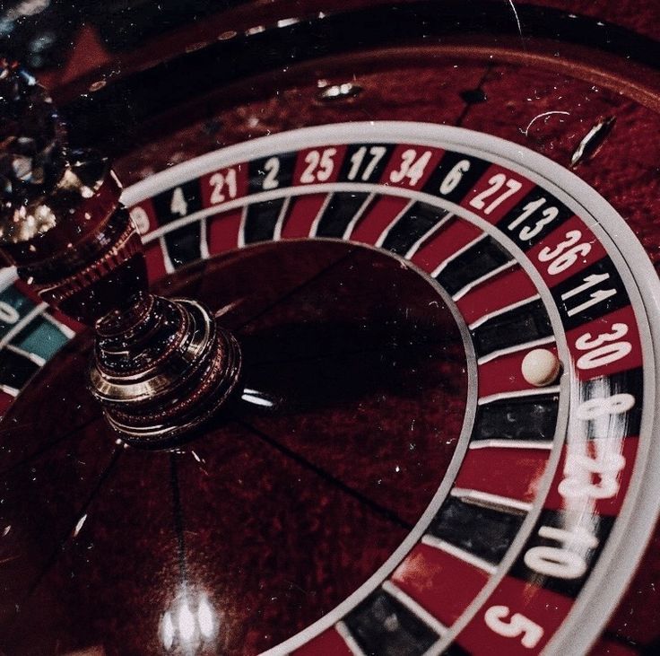 a close up of a casino rouleet with numbers on the front and sides