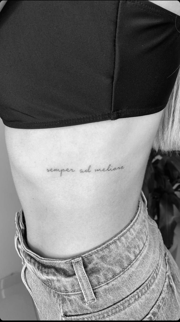 Below Rib Tattoo, Rib Cage Word Tattoos For Women, Quote Tattoos For Women Rib, Rib Cage Script Tattoo, Rib Tattoo Font, Ribcage Quote Tattoo, Rib Cursive Tattoo, Ribs Quote Tattoo, Writing Tattoo On Ribs