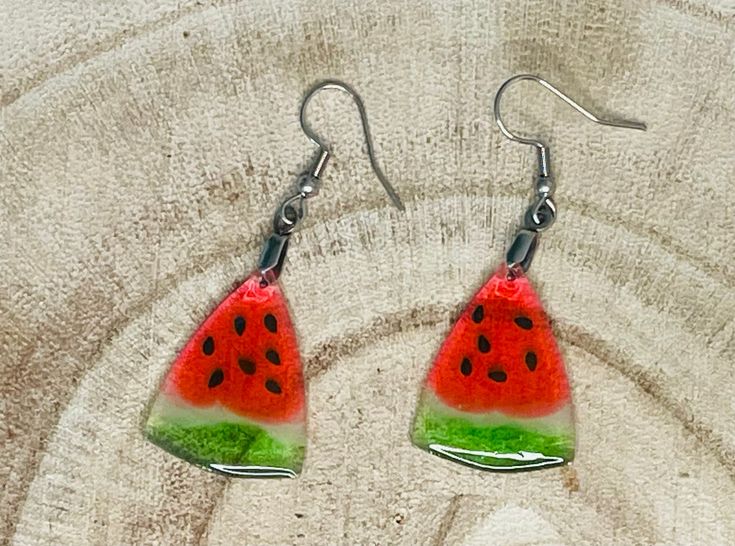 Adorable translucent watermelon earrings made with acrylic and resin. Resin bead is 30 long with Stainless steel earring hooks. Hypoallergenic Earrings For Summer Party, Fun Red Resin Jewelry, Handmade Red Plastic Earrings, Fun Red Resin Earrings, Green Resin Fun Earrings, Handmade Plastic Dangle Earrings, Green Resin Earrings For Summer, Fun Style Red Resin Earrings, Summer Glass Earrings For Gift