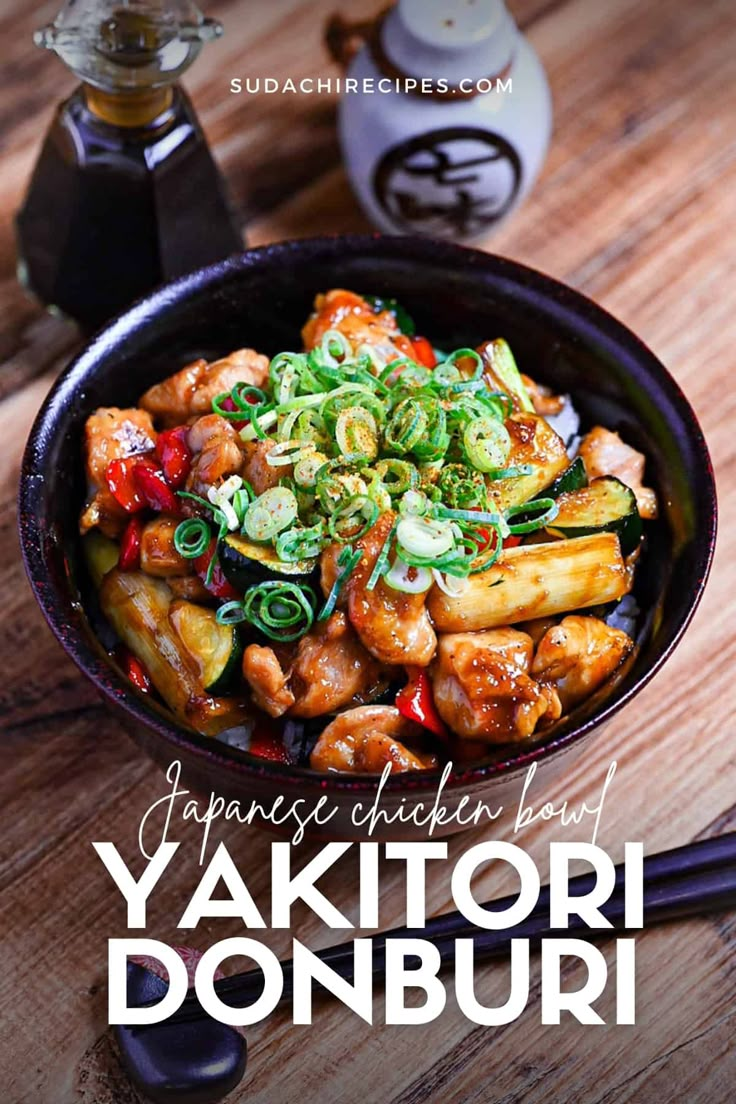 japanese chicken bay yaktori donburi with chopsticks on the side