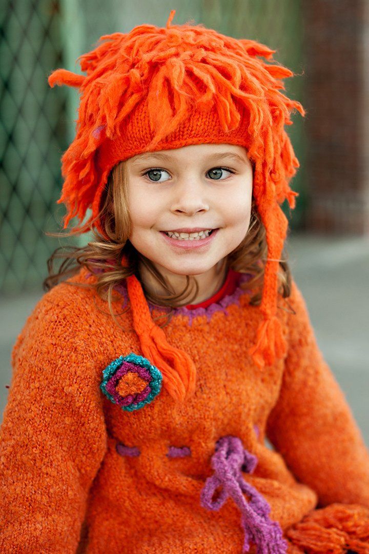 Fuzzy, furry, fabulous. This earflap beanie hat is the epitome of fun. Perfect for cold days or for ski trips, this beanie is made with warm acrylic material that is soft on your little one’s ears. Lots of fringe adds some pizazz while the strings can be tied for a more snug style. Pair it with a heavy coat for protection against the elements or with a cute top and legging for a standout accessory. This hat comes in red, orange, black, burgundy, pink, and light pink. After, hand wash and lay it Earflap Beanie, Kids Winter Hats, Ski Trips, Heavy Coat, Winter Hats Beanie, Winter Beanie, Acrylic Fabric, Ski Trip, Cute Top