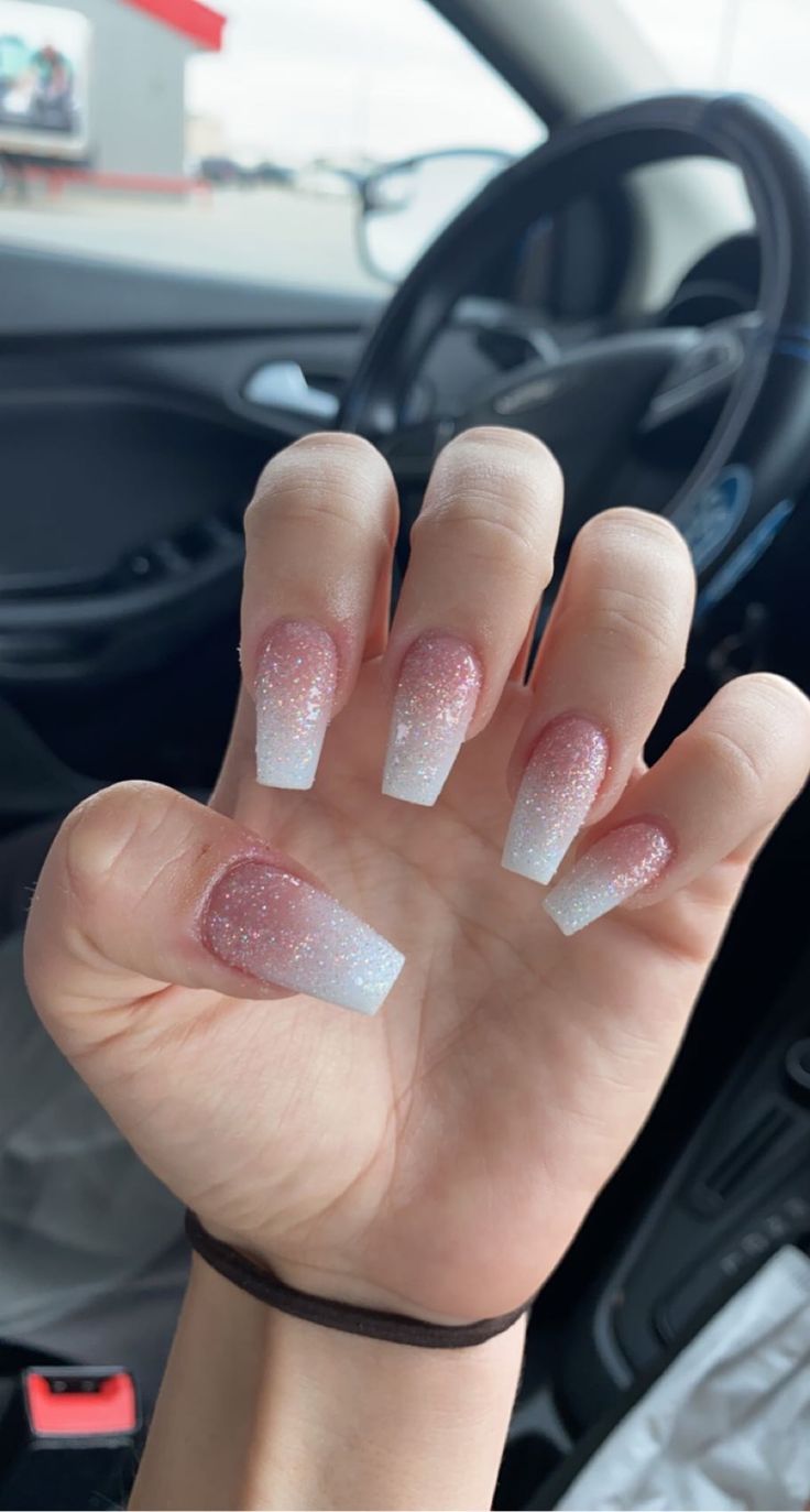 White Ombre Nails With Sparkle, Pink And Sparkle Acrylic Nails, White Nails White Glitter, Ombre Shiny Nails, Sparkly Ombre Nails Short, Glittery Pink Ombre Nails, Sparkly French Ombre Nails, Shimmery Ombre Nails, Pink White Ombré Nails