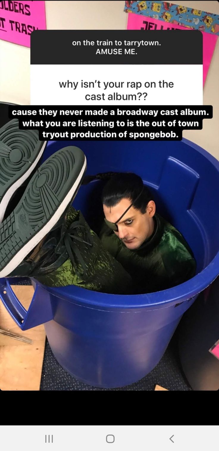 a man sitting in a blue trash can with his shoes on top of it and the caption says, why isn't your rap on the last album????