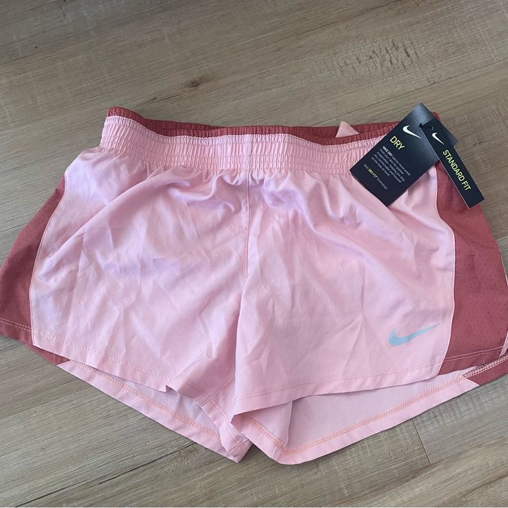 Nike 10k Shorts In Light Pink Color Lined Brief Women’s Size Medium New With Tags Never Worn Nike Summer Activewear Shorts, Nike Athletic Shorts For Spring, Nike Spring Activewear Shorts, Nike Spring Activewear, Nike Shorts With Built-in Liner For Spring, Nike Shorts For Spring, Nike Summer Workout Shorts, Pink Athletic Shorts With Pockets For Spring, Nike Pink Short Leg Bottoms