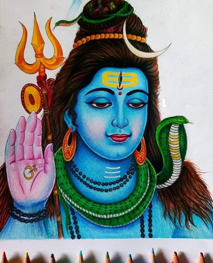 there is a drawing on the wall with colored pencils in front of it and an image of hindu god