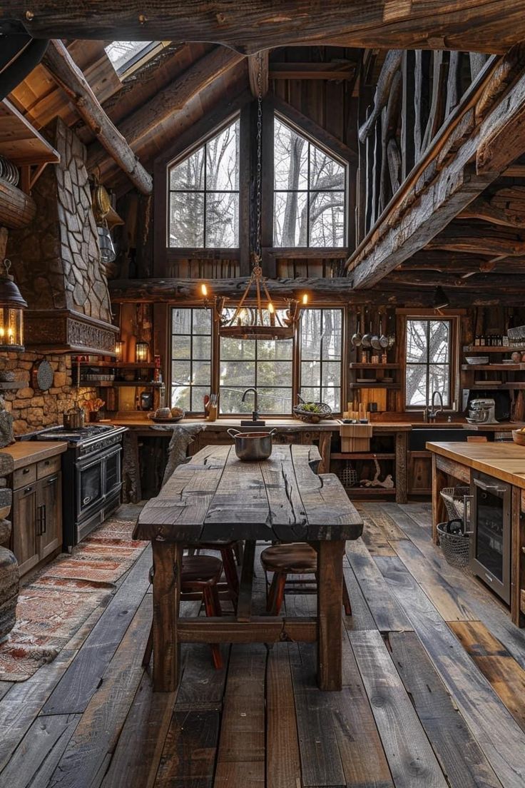 an old log cabin kitchen with wooden floors and beams on the ceiling is filled with rustic furniture